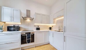 Fridge, microwave, oven, dishwasher