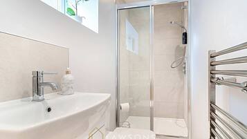 Shower, hair dryer, shampoo