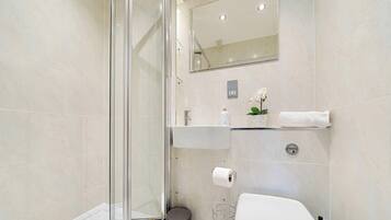 Shower, hair dryer, shampoo