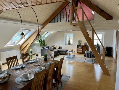 Spacious apartment over 2 floors in a central location with castle view, wallbox