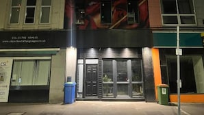 A building with a sign reading "STUDIO 95" and a website address "www.cityschooloflanguages.co.uk". - The Studio (Swansea)