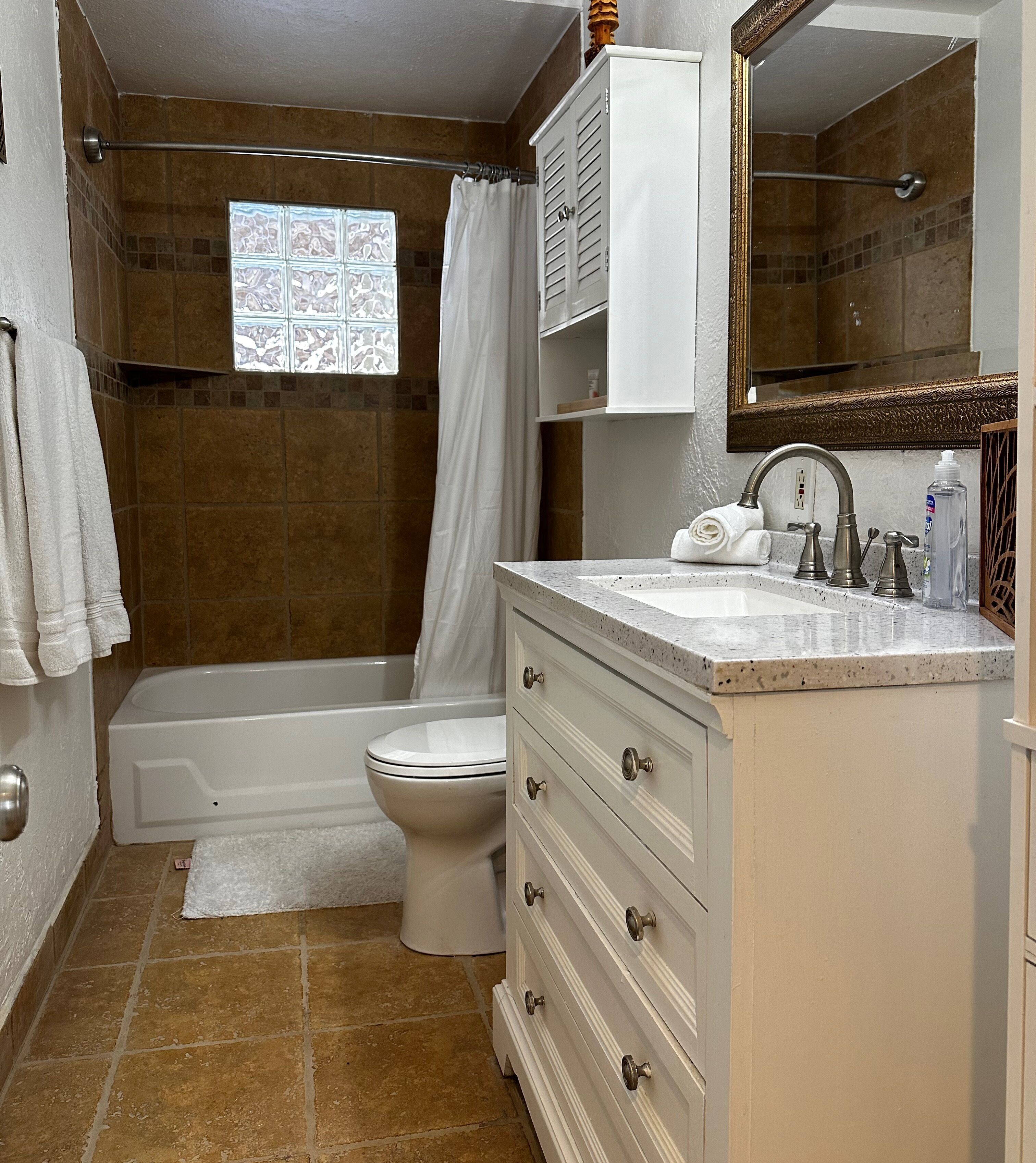 Hair dryer, towels, soap, shampoo