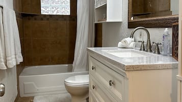 Hair dryer, towels, soap, shampoo