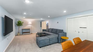 Comfort House | Living area | 40-inch flat-screen TV with digital channels