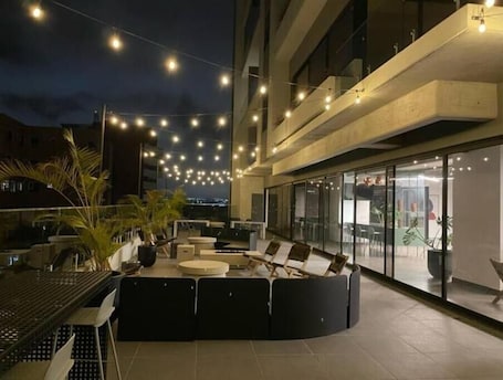 Outdoor dining. Stunning apartment with the best view.