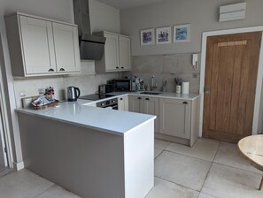 Apartment | Private kitchen | Fridge, microwave, oven, stovetop