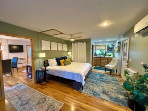 1 habitación, tabla de planchar con plancha y cuna de viaje