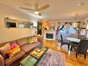 Smart TV, fireplace, books