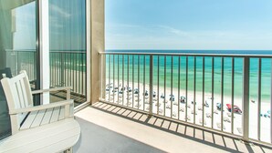 A balcony with a view of a beach and ocean. - Tidewater 502 (Panama City Beach)