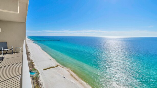 A balcony with a view of a beach and ocean. - Tidewater 2209 "tuscany at Tidewater" (Panama City Beach)