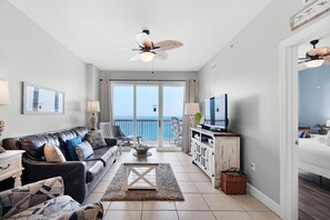 Condo, Multiple Beds (Sunrise Beach #910) | Living area | TV - Sunrise Beach #910 (Panama City Beach)
