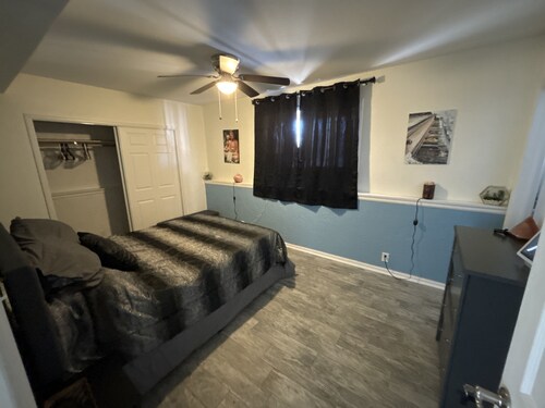 Private 1 bedroom guest suite with private living room, laundry, & kitchenette