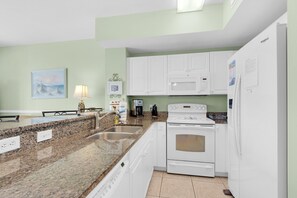 Condo, 1 King Bed with Sofa bed (Celadon 703) | Private kitchen | Oven, toaster - Celadon 703 (Panama City Beach)