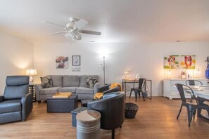 Smart TV, fireplace, books, music library