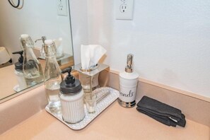 Hair dryer, towels, soap, shampoo