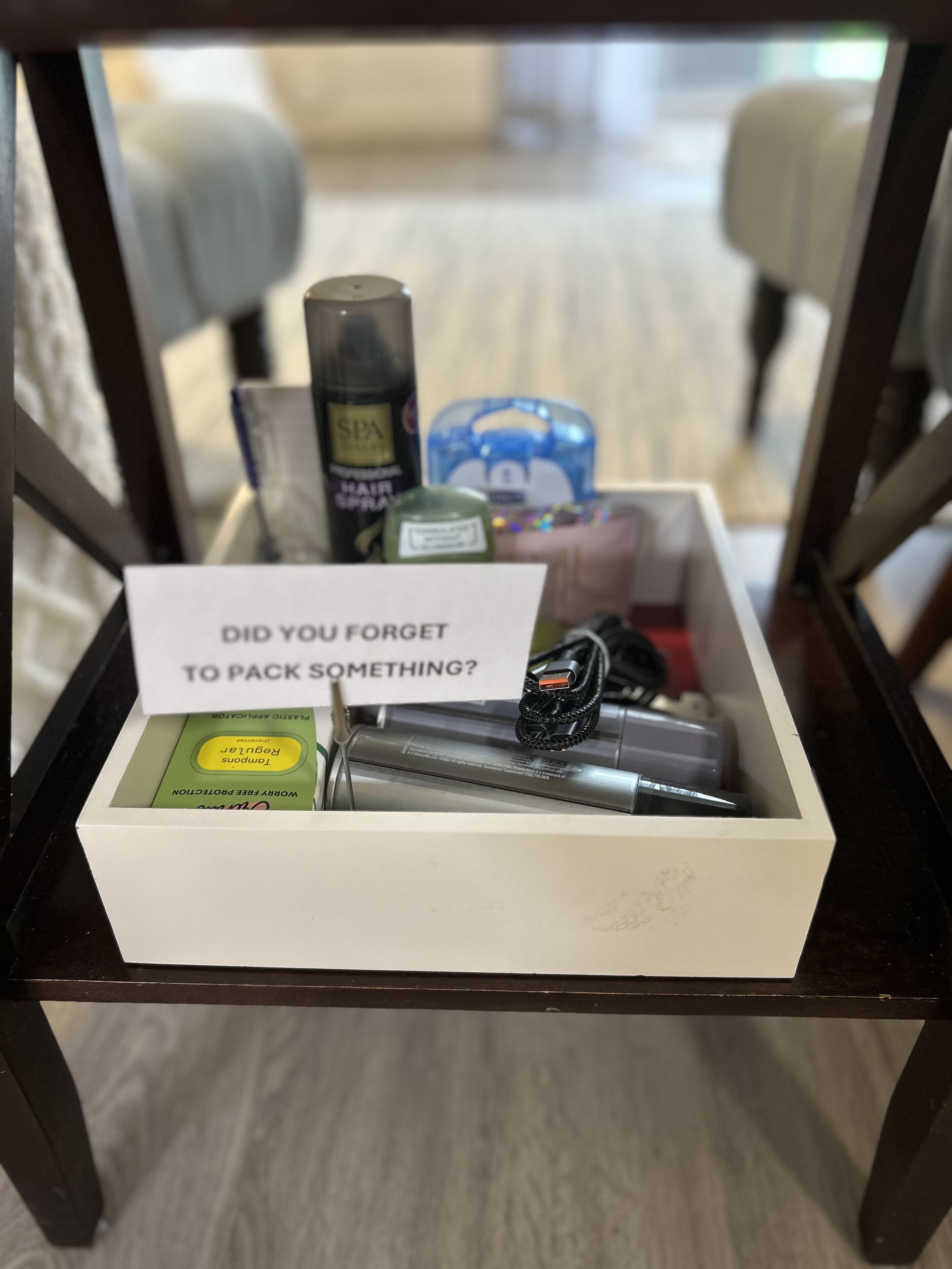 A storage box with a sign asking if someone forgot to pack something.