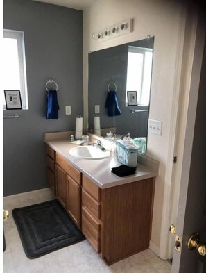 Hair dryer, towels, soap, shampoo