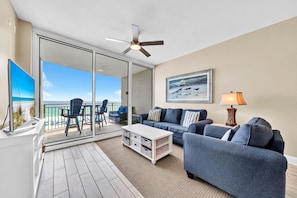 Condo, Multiple Beds (Aqua Resort 306 "Change of Pace") | Living area | TV