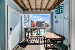 Outdoor dining - The SeaOats at Seascape Oceanside Beach Condo (Carolina Beach)