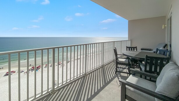 A balcony with a view of the beach and ocean. - Windemere 807 (Pensacola)