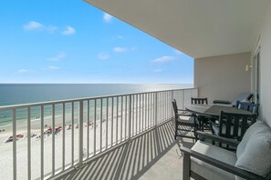 A balcony with a view of the beach and ocean. - Windemere 807 (Pensacola)