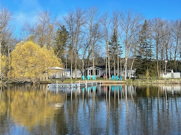 Relax and enjoy the chairs and umbrella on the dock!