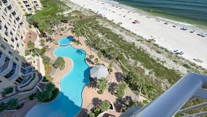 A resort with a large pool, beach, and ocean view. - Indigo West 1101 (Pensacola)