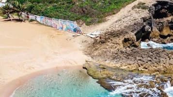 On the beach, sun loungers, beach towels