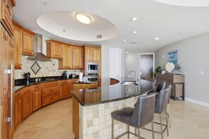 Condo, Multiple Beds (Capri 302) | Private kitchen | Oven, toaster, paper towels