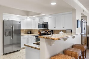 Condo, Multiple Beds (SeaSpray East 924- Gulf Front) | Private kitchen | Oven, toaster, paper towels
