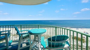 A balcony with a view of the beach and ocean. - Perdido Towers West 908 (Pensacola)