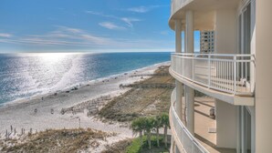 A beachfront hotel with balconies overlooking the beach and ocean. - La Playa 502 (Pensacola)