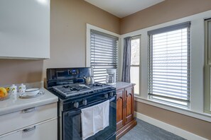 Fridge, microwave, stovetop, cookware/dishes/utensils