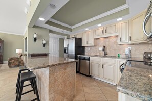 Condo, 1 King Bed with Sofa bed (SeaSpray West 105- Gulf Front) | Private kitchen | Oven, toaster, paper towels - Seaspray West 105- Gulf Front (Pensacola)