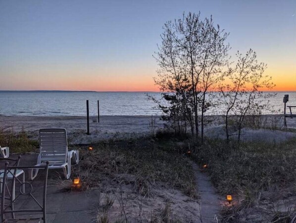 On the beach, sun-loungers, beach towels