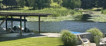 #8 cottage comes with boat docks and shares over 600’ of frontage on Hamlin lake