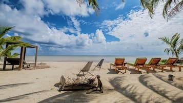 Private beach, white sand, sun loungers, beach towels