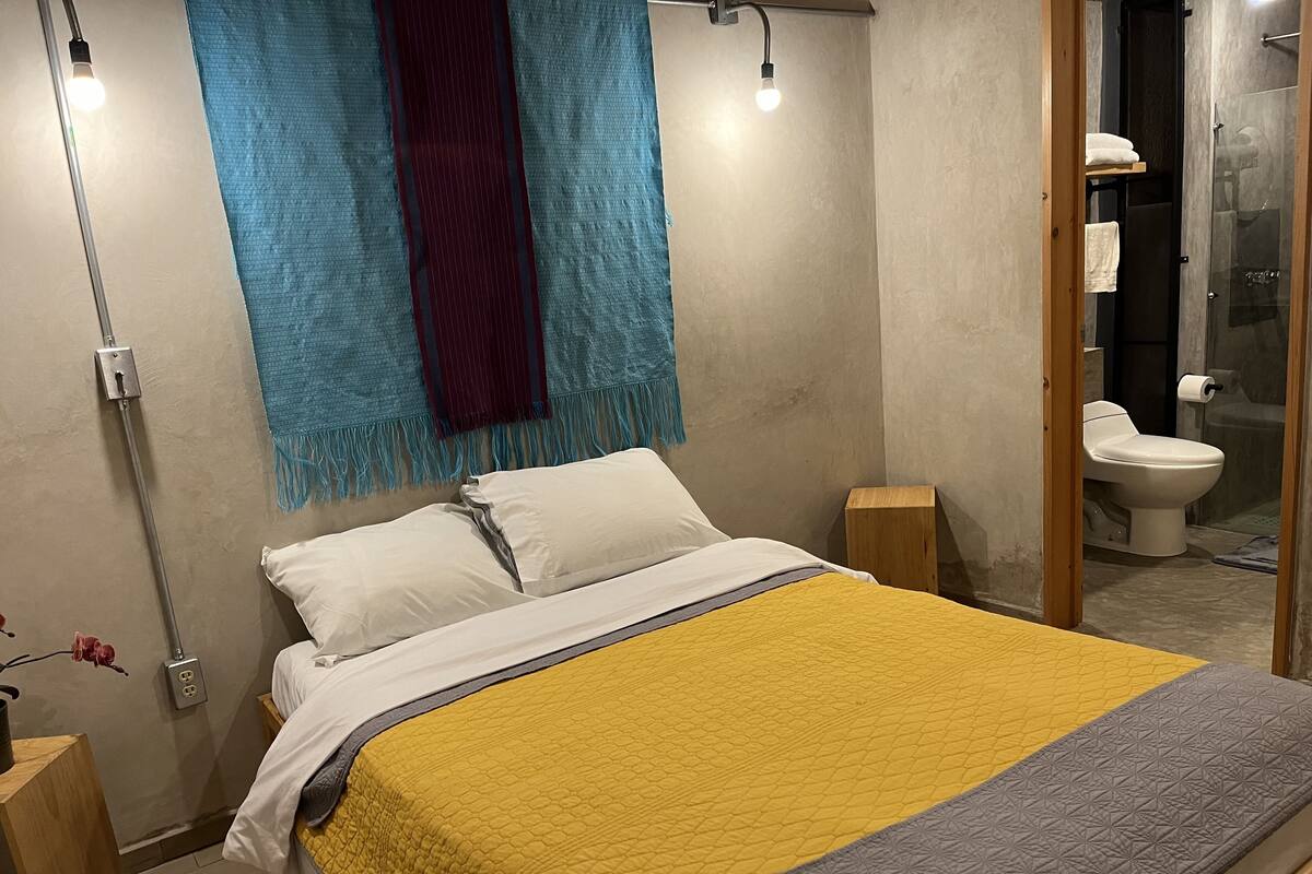 Premium bedding, down duvets, pillow-top beds, laptop workspace