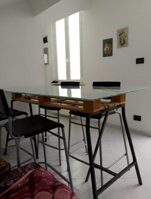 Apartment, 1 Bedroom | Dining - Spacious and Naturally Bright Bomboniera Rooftop Favors Apartment (Genoa)