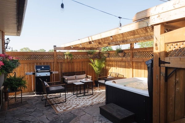 Soak in our comfortable hot tub, located in a completely private courtyard.