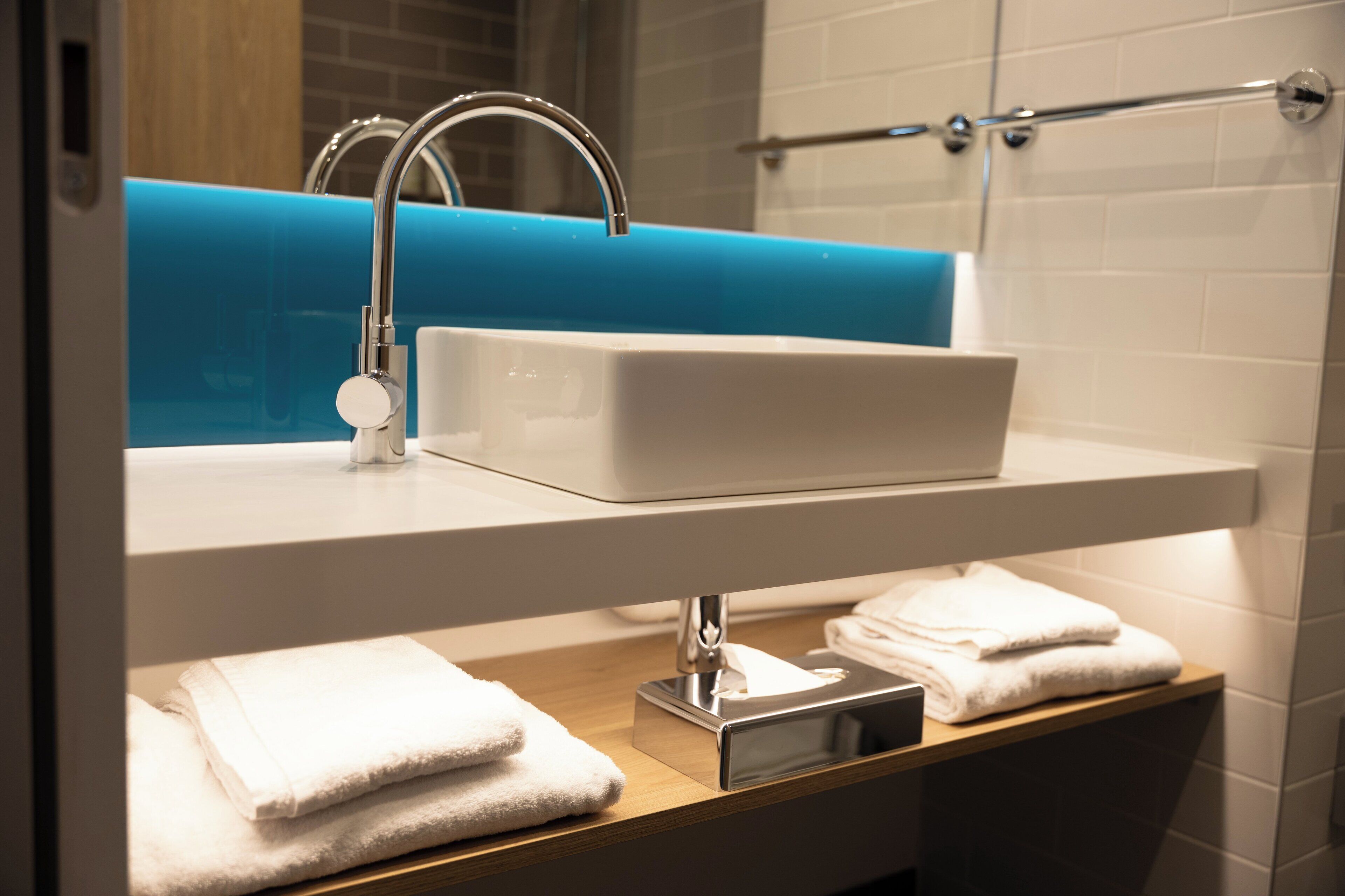 Ducha, artículos de higiene personal gratuitos y secador de pelo