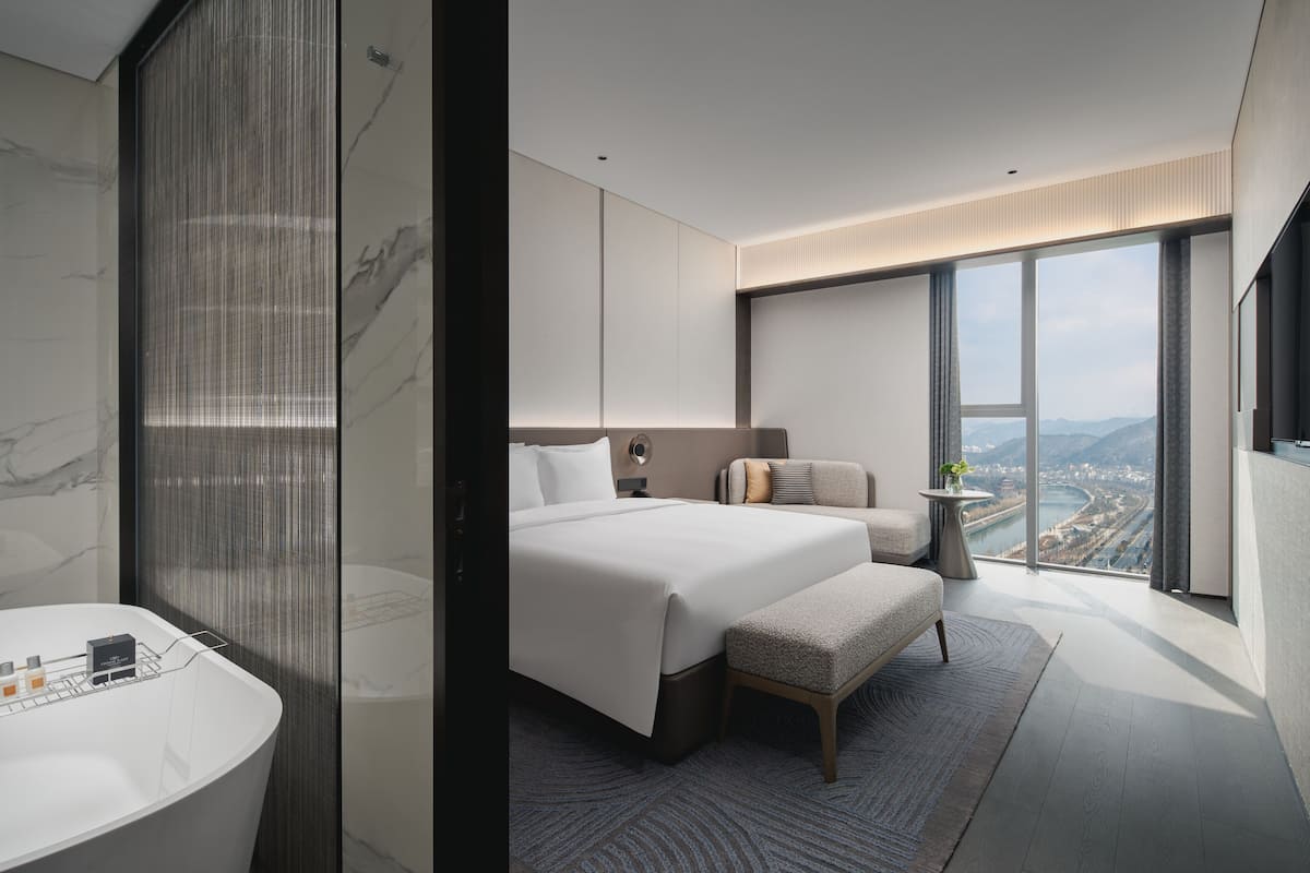 Suite, 1 Bedroom | In-room safe, soundproofing, iron/ironing board, free WiFi