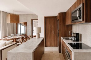 Fridge, microwave, stovetop, coffee/tea maker