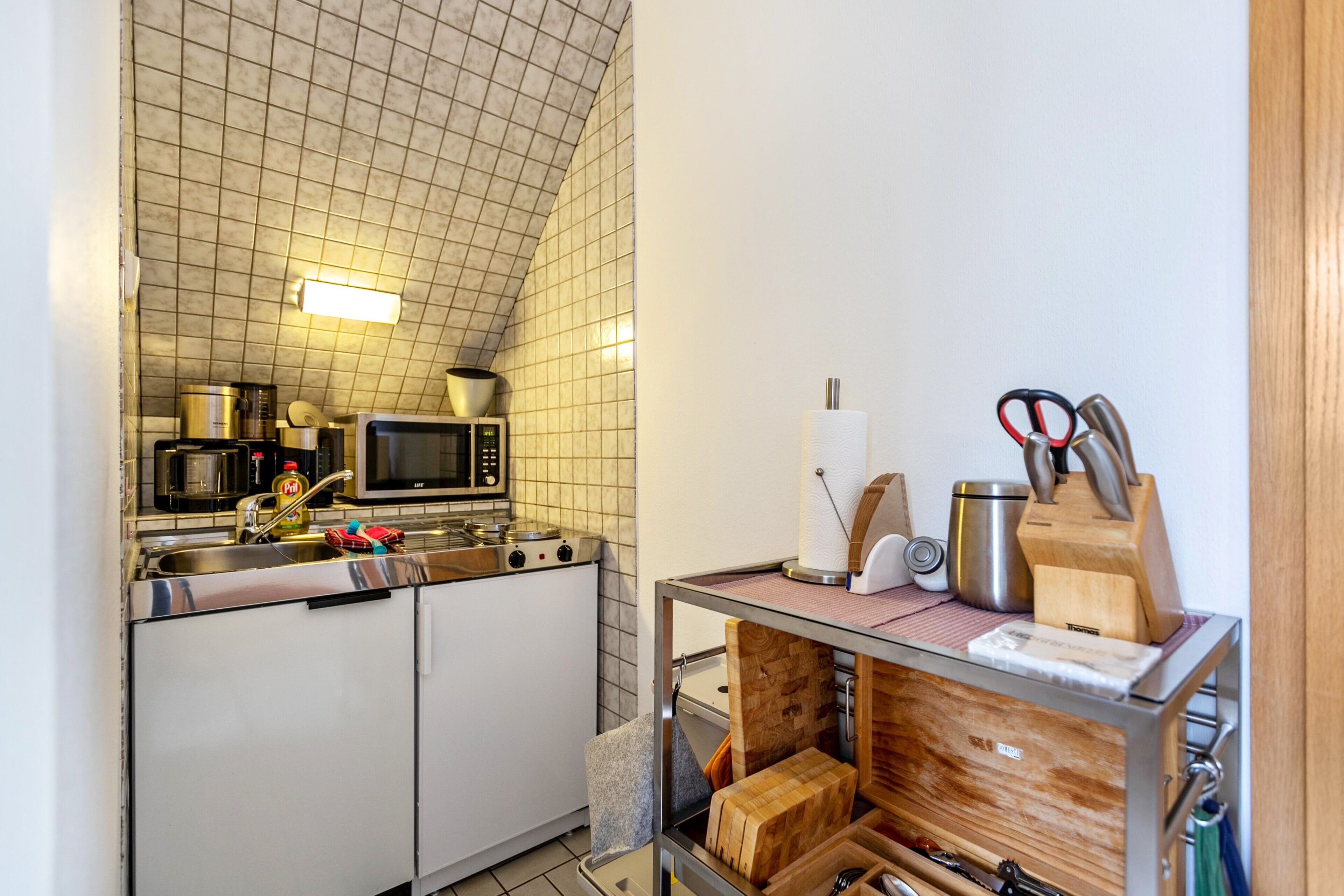 Fridge, microwave, stovetop, coffee/tea maker