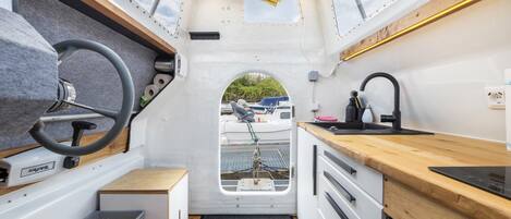 Fridge, stovetop, cookware/dishes/utensils