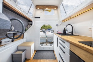 Fridge, stovetop, cookware/dishes/utensils