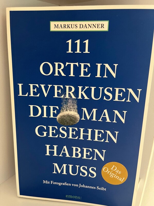A book cover with the title '111 Orte in Leverkusen die man gesehen haben muss' by Markus Danner.