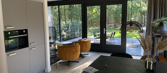Nice holiday home in a wooded area