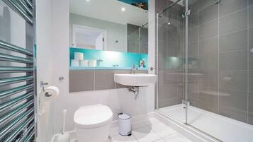 Shower, hair dryer, towels