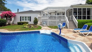 A backyard with a swimming pool, a covered patio, and a house. - Tranquil Arrington Cottage ~ 7 Mi to Franklin! (Arrington)